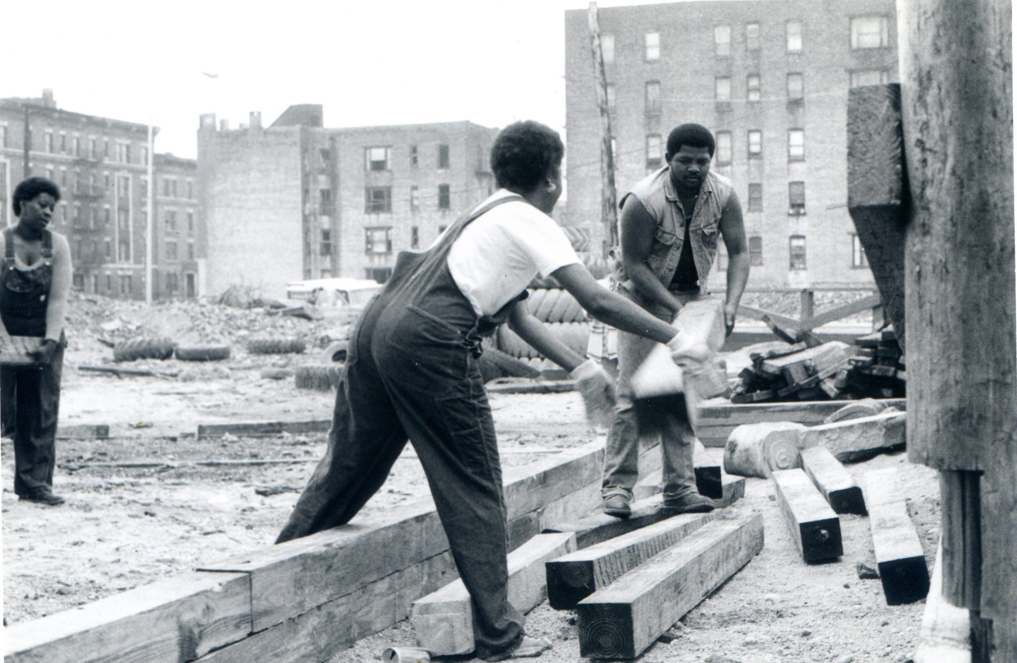http://mdfilmfest.net/wp-content/uploads/02469_EricWingate_Woman-and-Man-carrying-wood-pillar-bw.jpg